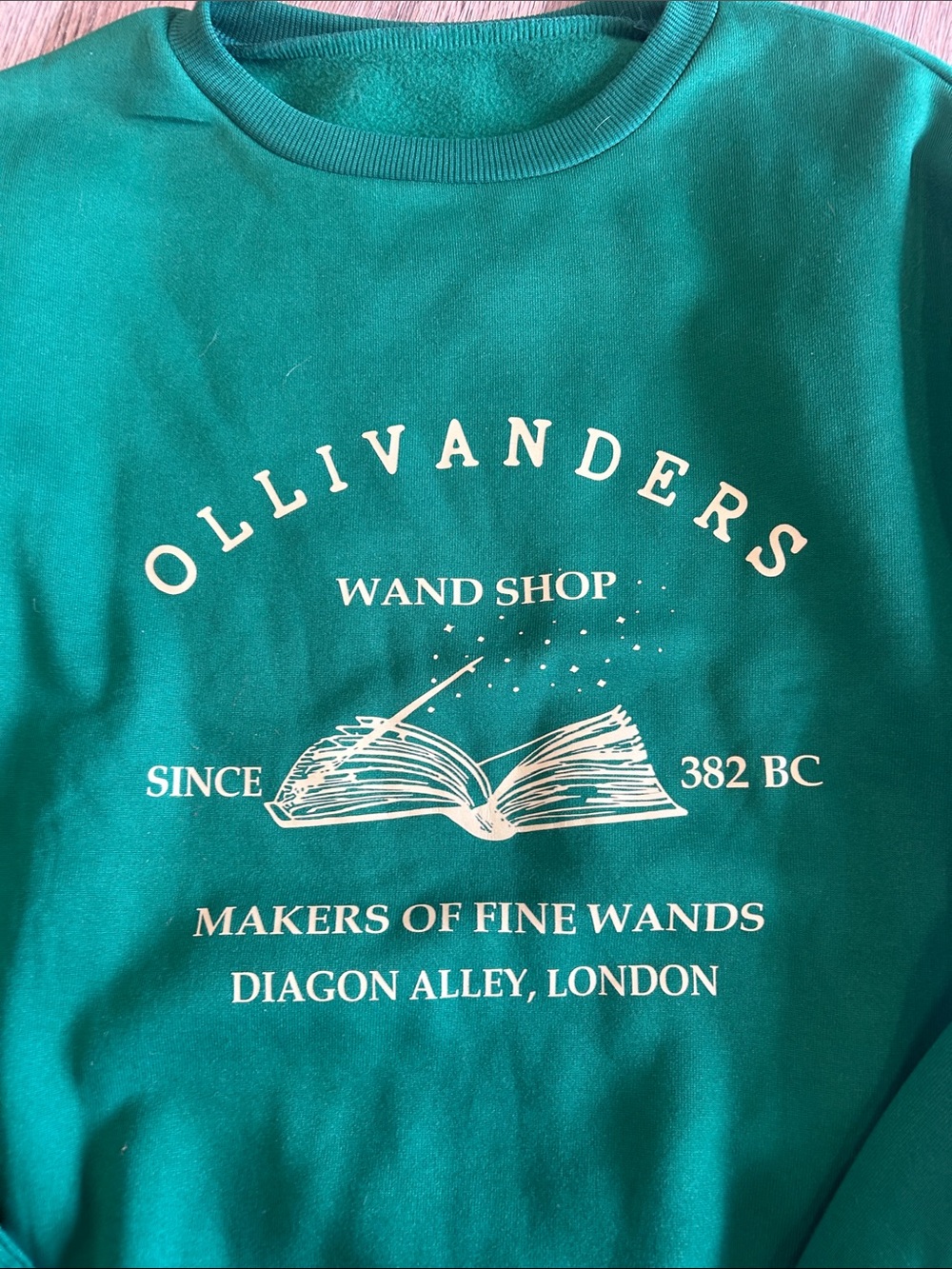 Ollivanders Wand Shop Green Graphic Sweatshirt
